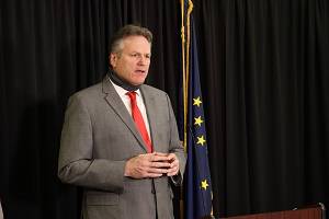 Gov. Mike Dunleavy speaks at an Anchorage news conference on Dec. 11, 2020. In a Sunday news conference, Dunleavy discussed the end of Alaskas longtime COVID-19 disaster declaration and what it means for the states response to the virus. (Courtesy photo / Office of Gov. Mike Dunleavy)