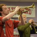 Silas Thibodeau and Dakota Wisnewski rehearse during a KCHS Marching Band practice on Aug. 18, 2022, in Kenai, Alaska. (Jake Dye/Peninsula Clarion)
