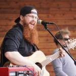 Ben Mattox performs as part of BenJammin & The Jammin Band during the Levitt AMP Soldotna Music Series on Wednesday, June 7, 2023, at Soldotna Creek Park in Soldotna, Alaska. (Jake Dye/Peninsula Clarion)