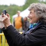 Attendees gather before the stage as Connie Brannocks Tiny House of Funk performs during the Soldotna Music Series at Soldotna Creek Park in Soldotna, Alaska, on Wednesday, June 21, 2023. (Jake Dye/Peninsula Clarion)