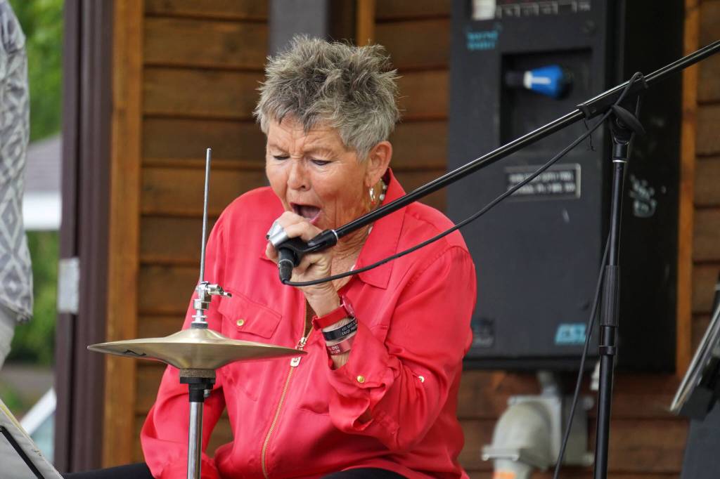 Connie Brannock, part of Connie Brannocks Tiny House of Funk, performs during the Soldotna Music Series at Soldotna Creek Park in Soldotna, Alaska, on Wednesday, June 21, 2023. (Jake Dye/Peninsula Clarion)