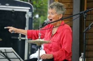 Connie Brannock, part of Connie Brannocks Tiny House of Funk, performs during the Soldotna Music Series at Soldotna Creek Park in Soldotna, Alaska, on Wednesday, June 21, 2023. (Jake Dye/Peninsula Clarion)