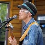 Mitzi Cowell, part of Connie Brannocks Tiny House of Funk, performs during the Soldotna Music Series at Soldotna Creek Park in Soldotna, Alaska, on Wednesday, June 21, 2023. (Jake Dye/Peninsula Clarion)