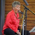 Connie Brannock, part of Connie Brannocks Tiny House of Funk, performs during the Soldotna Music Series at Soldotna Creek Park in Soldotna, Alaska, on Wednesday, June 21, 2023. (Jake Dye/Peninsula Clarion)