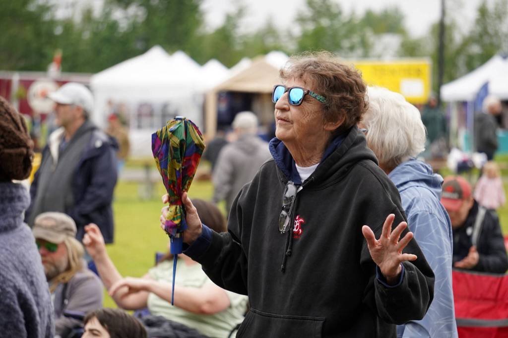 Attendees dance before the stage as Wasabi Black performs during the Soldotna Music Series at Soldotna Creek Park in Soldotna, Alaska, on Wednesday, June 21, 2023. (Jake Dye/Peninsula Clarion)