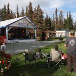 Community members attend the RockN the Ranch at the Rusty Ravin Music Festival in Kenai, Alaska, on Friday, July 8, 2022. (Camille Botello/Peninsula Clarion)