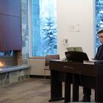 Justin Ruffridge performs during Music by the Fire at the Soldotna Public Library in Soldotna, Alaska, on Thursday, Dec. 21, 2023. (Jake Dye/Peninsula Clarion)