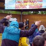 Attendees dance in the rain as Hope Social Club headlines the opening night of the 2024 Levitt AMP Soldotna Music Series at Soldotna Creek Park in Soldotna, Alaska, on Wednesday, June 5, 2024. (Jake Dye/Peninsula Clarion)