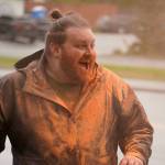 Joe Spady, initially tasked with coloring people, finds the color turned back towards himself during a color run as part of the opening night of the Levitt AMP Soldotna Music Series along the Sterling Highway in Soldotna, Alaska, on Wednesday, June 5, 2024. (Jake Dye/Peninsula Clarion)