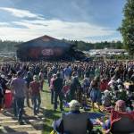 Concertgoers pack the grounds at the River Stage Amphitheater for a performance by The Devil Makes Three at Salmonfest on Sunday, Aug. 4, 2024, in Ninilchik, Alaska. (Delcenia Cosman/Homer News)