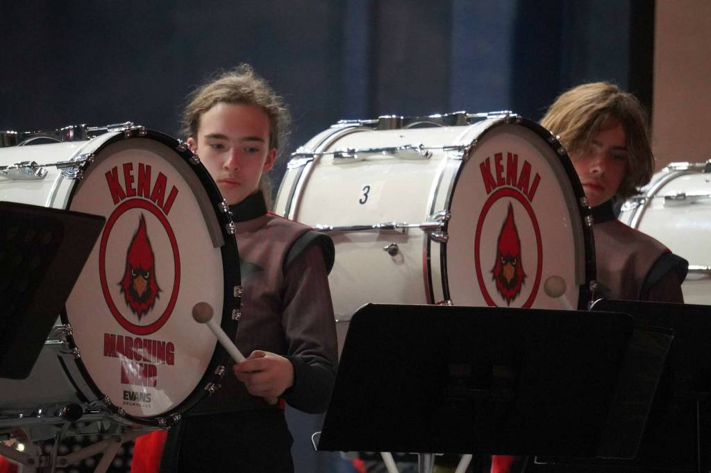 The Kenai Marching Band debuts their new routine based on The Hunger Games: The Ballad of Songbirds & Snakes during an exhibition at Kenai Central High School on Friday, Aug. 16, 2024. (Jake Dye/Peninsula Clarion)