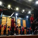 The Kenai Marching Band debuts their new routine based on The Hunger Games: The Ballad of Songbirds & Snakes during an exhibition at Kenai Central High School on Friday, Aug. 16, 2024. (Jake Dye/Peninsula Clarion)