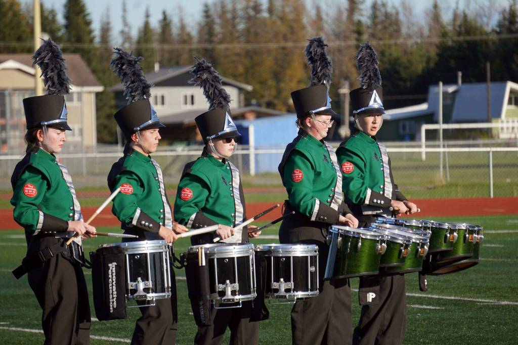 The Colony High School marching band, Thee Northern Sound, performs during the Kenai Marching Showcase at Ed Hollier Field in Kenai, Alaska, on Saturday, Sept. 21, 2024. (Jake Dye/Peninsula Clarion)