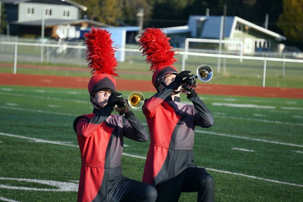 The Kenai Central High School Marching Band performs Snakes and Songbirds: The Music of the Hunger Games during the Kenai Marching Showcase at Ed Hollier Field in Kenai, Alaska, on Saturday, Sept. 21, 2024. (Jake Dye/Peninsula Clarion)