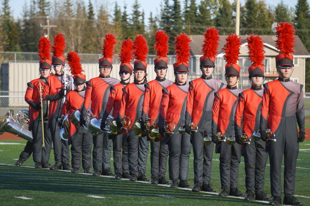 The Kenai Central High School Marching Band performs Snakes and Songbirds: The Music of the Hunger Games during the Kenai Marching Showcase at Ed Hollier Field in Kenai, Alaska, on Saturday, Sept. 21, 2024. (Jake Dye/Peninsula Clarion)