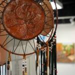 Artwork by Susie Scrivner for her exhibition, Portraits of the Kenai, fills the walls of the Kenai Art Center in Kenai, Alaska, on Thursday, Oct. 3, 2024. (Jake Dye/Peninsula Clarion)