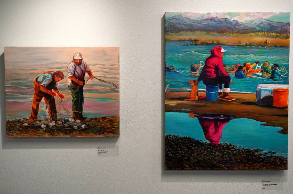 Artwork by Susie Scrivner for her exhibition, Portraits of the Kenai, fills the walls of the Kenai Art Center in Kenai, Alaska, on Thursday, Oct. 3, 2024. (Jake Dye/Peninsula Clarion)