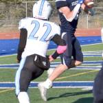 Soldotnas Trevor Michael catches a touchdown pass in front of Chugiaks Makai Warren-Dowl in the Division II semifinal Saturday, Oct. 19, 2024, at Justin Maile Field at Soldotna High School in Soldotna, Alaska. (Photo by Jeff Helminiak/Peninsula Clarion)