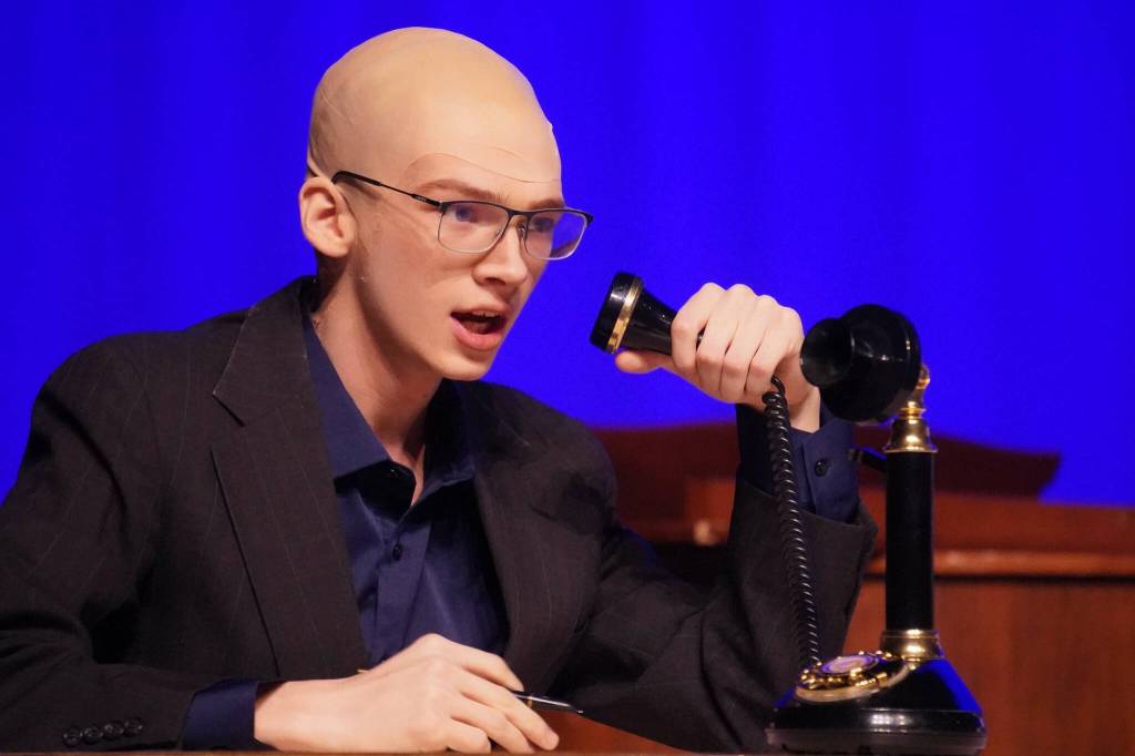 Gavin Hunt, part of the cast of Annie, rehearses at Kenai Central High School in Kenai, Alaska, on Wednesday, Nov. 6, 2024. (Jake Dye/Peninsula Clarion)