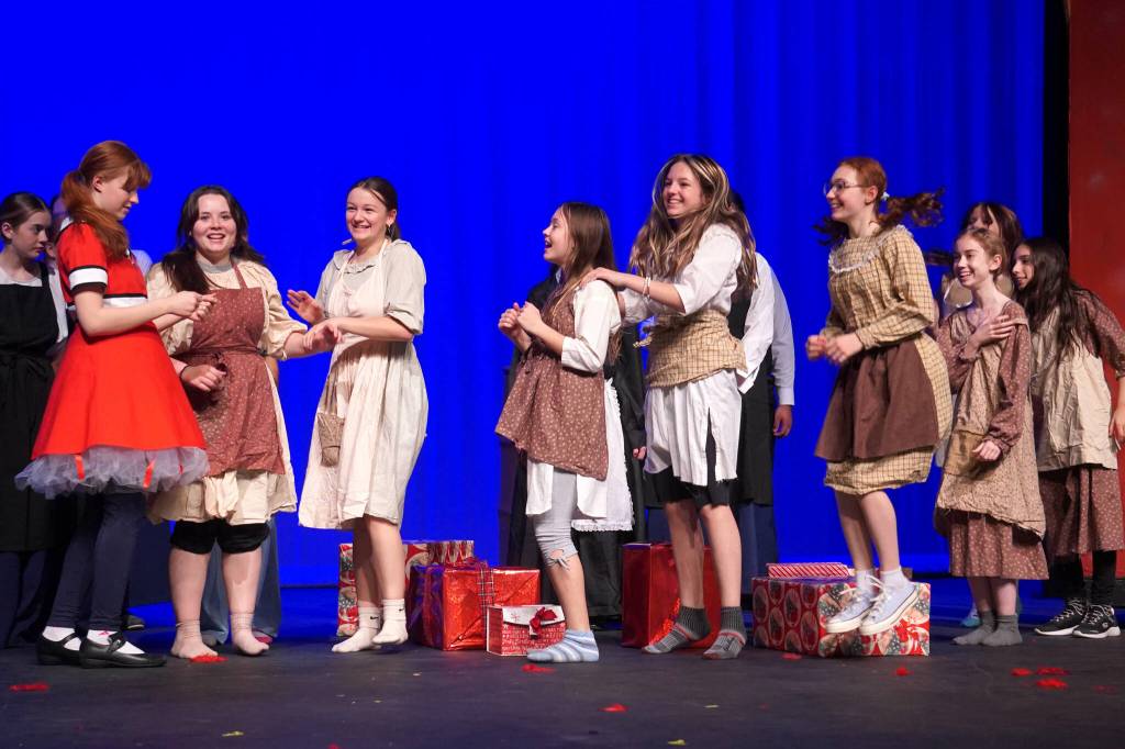 The cast of Annie rehearse at Kenai Central High School in Kenai, Alaska, on Wednesday, Nov. 6, 2024. (Jake Dye/Peninsula Clarion)