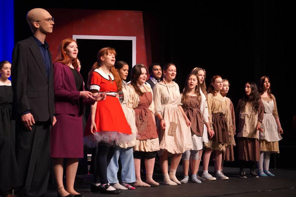 The cast of Annie rehearse at Kenai Central High School in Kenai, Alaska, on Wednesday, Nov. 6, 2024. (Jake Dye/Peninsula Clarion)