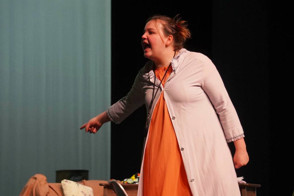 Lizzy Johnson, part of the cast of Annie, rehearses at Kenai Central High School in Kenai, Alaska, on Wednesday, Nov. 6, 2024. (Jake Dye/Peninsula Clarion)