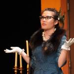 Nia Mulholland-Kim, as Mrs. Peacock, rehearses Seward High School Theatre Collectives Clue at Seward High School in Seward, Alaska, on Thursday, Nov. 7, 2024. (Jake Dye/Peninsula Clarion)