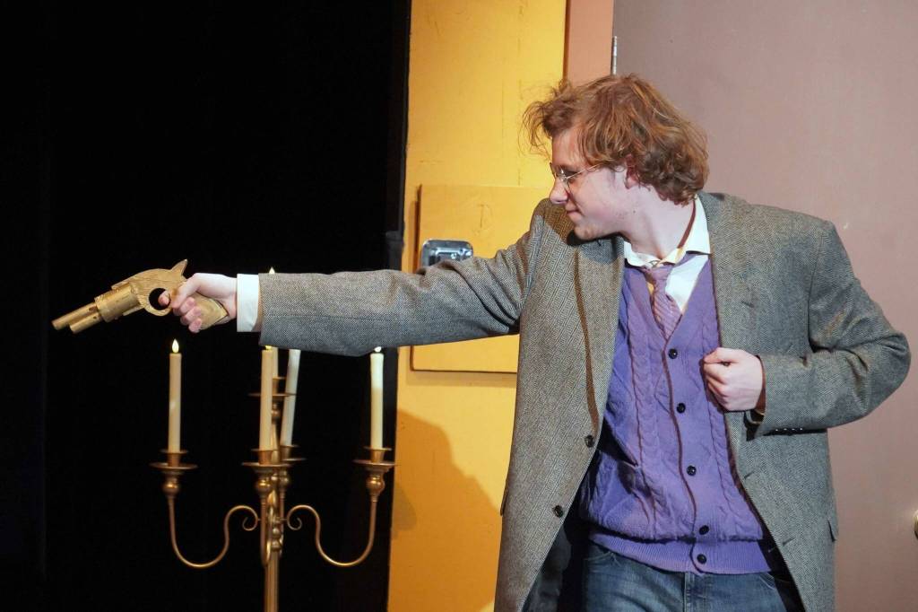 Kameron Smith, as Professor Plum, rehearses Seward High School Theatre Collectives Clue at Seward High School in Seward, Alaska, on Thursday, Nov. 7, 2024. (Jake Dye/Peninsula Clarion)