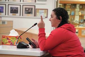 Shannon Ferguson speaks during a meeting of the Kenai Peninsula Borough School Districts Board of Education in Soldotna on Monday. (Jake Dye/Peninsula Clarion)