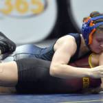 Soldotnas Mia Hannevold wrestles to a technical fall over Nevaeh George of Mt. Edgecumbe in the final at 114 pounds at the girls state wrestling tournament Saturday, Dec. 21, 2024, at the Alaska Airlines Center in Anchorage, Alaska. (Photo by Jeff Helminiak/Peninsula Clarion)