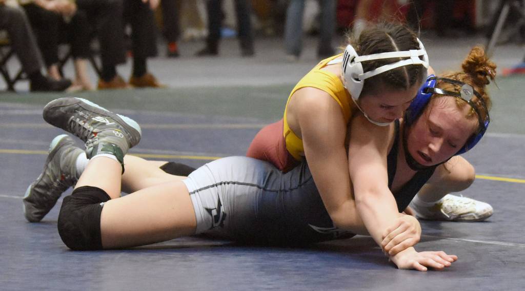 Hoonahs Krista Howland wrestles to a pin against Soldotnas Rowan Peck in the final at 126 pounds at the girls state wrestling tournament Saturday, Dec. 21, 2024, at the Alaska Airlines Center in Anchorage, Alaska. (Photo by Jeff Helminiak/Peninsula Clarion)