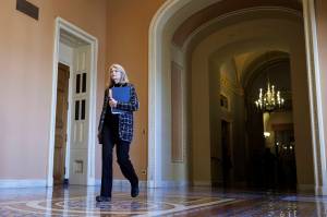 Sen. Lisa Murkowski (R-Alaska) walks to the Senate chamber ahead of a vote at the Capitol in Washington, on Wednesday, Jan. 22, 2025. (Tom Brenner/The New York Times)