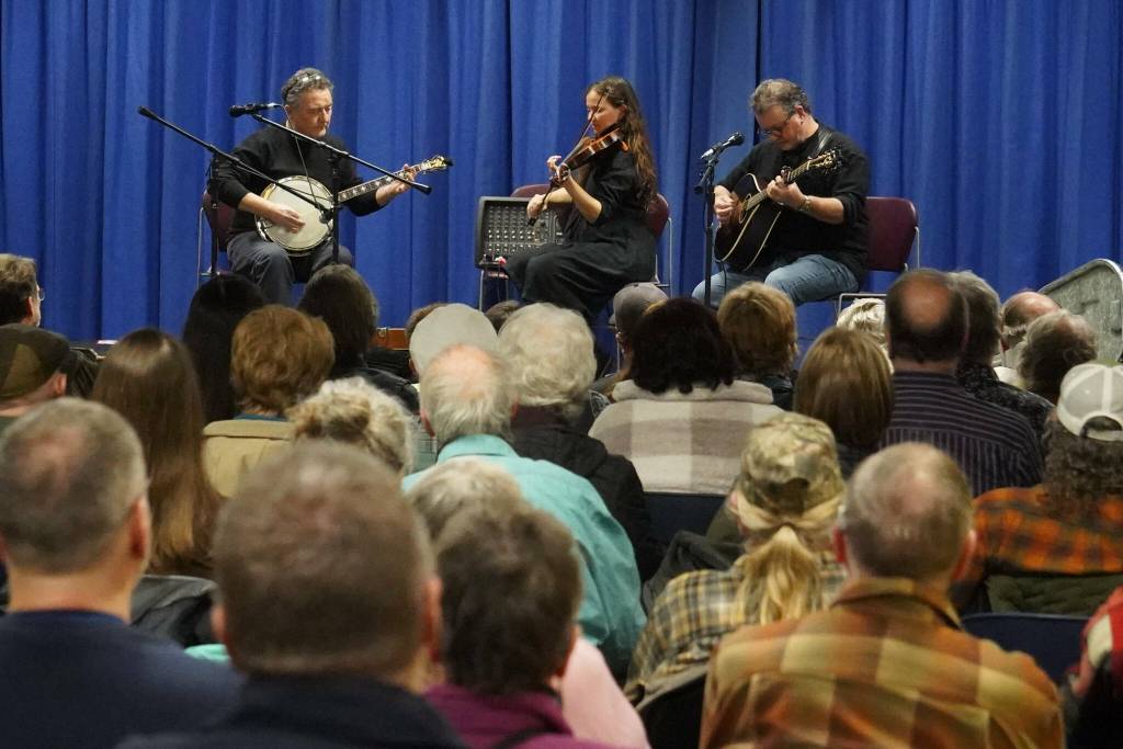 John Walsh, Jannell Canerday and Pat Broaders perform during An Evening of Traditional Irish Music at Kenai Peninsula College in Soldotna, Alaska, on Friday, Jan. 24, 2025. (Jake Dye/Peninsula Clarion)