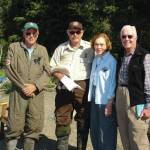 Left to right: Tom Griffiths, former Denali National Park chief ranger and refuge volunteer; Rick Johnston, Kenai National Wildlife Refuge pilot/ranger; Rosalynn Carter and former President Jimmy Carter are photographed at Alaska Wildland Adventures Kenai Back Country Lodge beach, Skilak Lake, Kenai National Wildlife Refuge<ins>,</ins> <ins>Alaska</ins>. (Photo by Kirk Hoessle/courtesy)