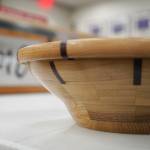 Wooden bowls crafted by Nikiski Middle/High School students are displayed during a meeting of the Kenai Peninsula Borough School Districts Board of Education in Soldotna, Alaska, on Monday, Feb. 3, 2025. (Jake Dye/Peninsula Clarion)
