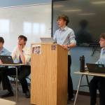 Kenneth Fine and Connor Marks, left, debate Cy Garcia and Ethan Anding, right, during the Kenai Peninsula Borough School District Drama, Debate and Forensics Invitational at Soldotna High School on Saturday, Feb. 15, 2025. (Jake Dye/Peninsula Clarion)
