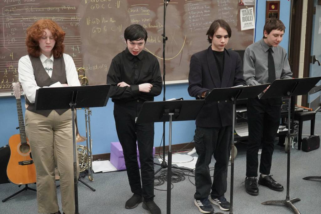 Homers Erin Allen, Alex Brock, Mattias Watson and Trygg Flyum perform Law and Order: Fairytale Unit during the Kenai Peninsula Borough School District Drama, Debate and Forensics Invitational at Soldotna High School on Saturday, Feb. 15, 2025. (Jake Dye/Peninsula Clarion)