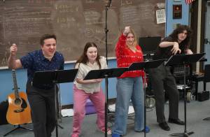 Jackson Hooper, Oshie Broussard, Belle Morris and Kincaid Jenness perform Shakespeare Abridged during the Kenai Peninsula Borough School District Drama, Debate and Forensics Invitational at Soldotna High School on Saturday, Feb. 15, 2025. (Jake Dye/Peninsula Clarion)