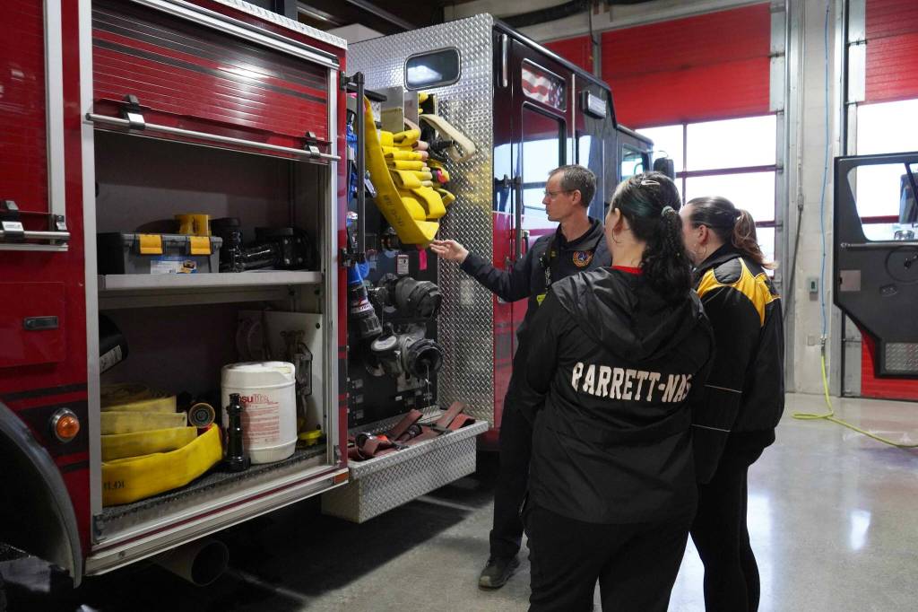 Fire Marshal Jeremy Hamilton gives a tour to students during Job Shadow Day at Kenai Fire Department in Kenai, Alaska, on Wednesday, Feb. 19, 2025. (Roddy Craig/Peninsula Clarion)