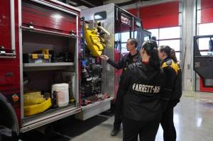 Fire Marshal Jeremy Hamilton gives a tour to students during Job Shadow Day at Kenai Fire Department in Kenai, Alaska, on Wednesday, Feb. 19, 2025. (Roddy Craig/Peninsula Clarion)