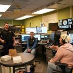 Makayla Derkevorkian demonstrates her work during Job Shadow Day at the Kenai Police Department in Kenai, Alaska, on Wednesday, Feb. 19, 2025. (Nizhonii Wood/Peninsula Clarion)