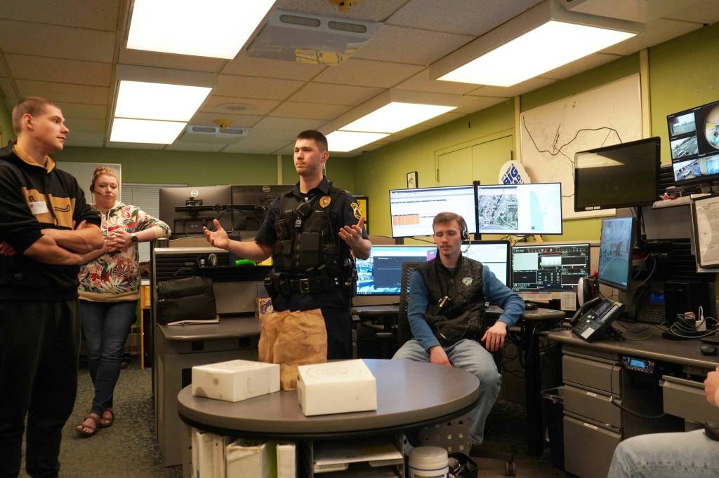 Chad Larsen speaks to students during Job Shadow Day at the Kenai Police Department in Kenai, Alaska, on Wednesday, Feb. 19, 2025. (Nizhonii Wood/Peninsula Clarion)