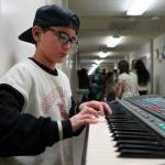 Soldotna Elementary School students perform in the halls during an art show and music fundraiser at Soldotna Elementary School in Soldotna, Alaska, on Thursday, Feb. 27, 2025. (Jake Dye/Peninsula Clarion)