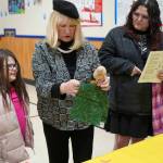 Students and families create puppets during a family art night hosted by Artist in Residence Shala Dobson, center, at Kaleidoscope School of Arts and Science in Kenai, Alaska, on Thursday, Feb. 27, 2025. (Jake Dye/Peninsula Clarion)