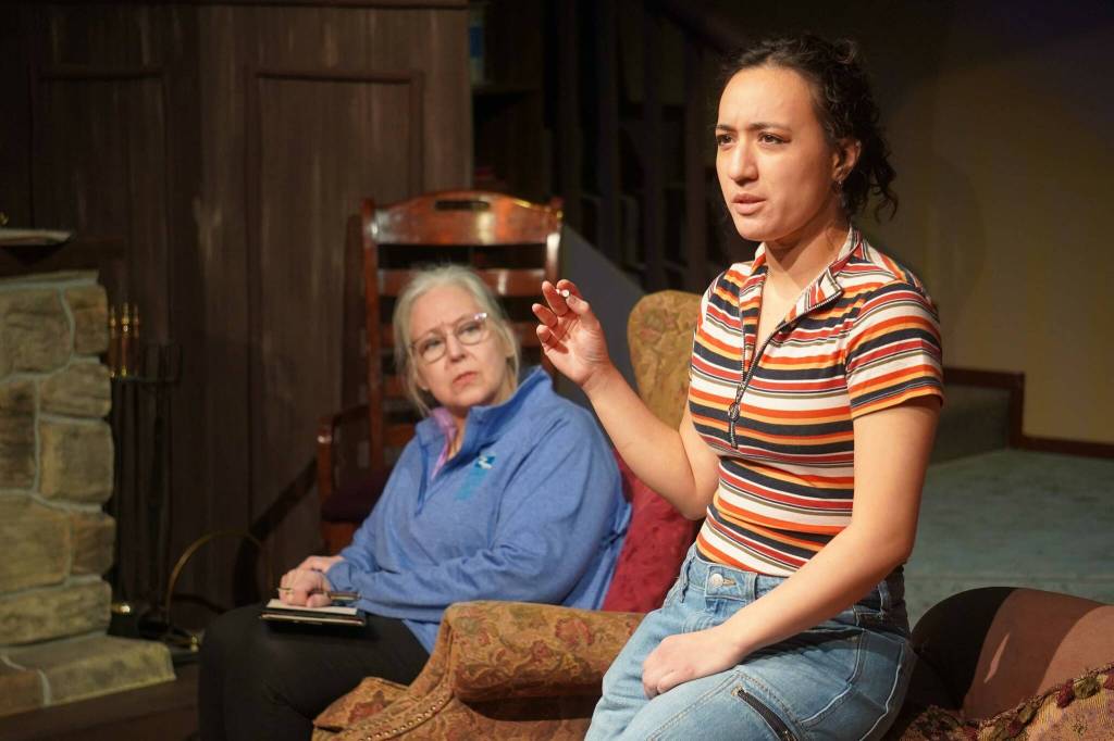 Petra Murray, right, and Yvette Tappana rehearse The Mousetrap at the Kenai Performers Theater near Soldotna, Alaska, on Wednesday, March 19, 2025. (Jake Dye/Peninsula Clarion)