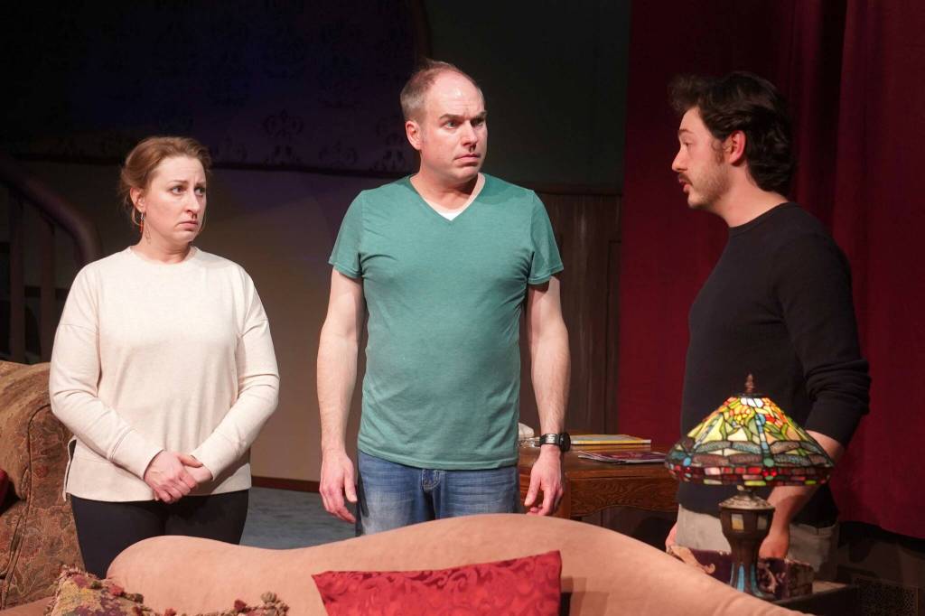 AnnMarie Rudstrom, Jamie Nelson and Raleigh Van Natta rehearse The Mousetrap at the Kenai Performers Theater near Soldotna, Alaska, on Wednesday, March 19, 2025. (Jake Dye/Peninsula Clarion)