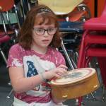 A second grader participates in a music lesson led by Delana Green at Tustumena Elementary School in Kasilof, Alaska, on Friday, March 21, 2025. (Jake Dye/Peninsula Clarion)