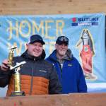 Kendall Soares holds up his ninth place trophy during the 2025 Homer Winter King Salmon Tournament on Saturday, March 22, 2025, at the Deep Water Dock on the Homer Spit in Homer, Alaska. (Delcenia Cosman/Homer News)