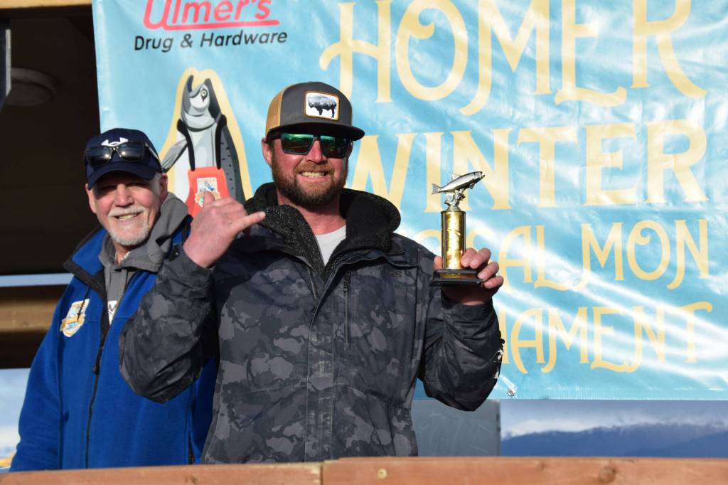 Jace Power poses with his fourth-place trophy during the 2025 Homer Winter King Salmon Tournament on Saturday, March 22, 2025, at the Deep Water Dock on the Homer Spit in Homer, Alaska. (Delcenia Cosman/Homer News)