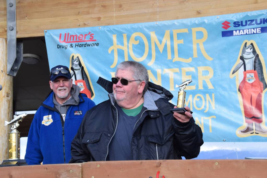 Jeffery Anderson poses with his sixth-place trophy during the 2025 Homer Winter King Salmon Tournament on Saturday, March 22, 2025, at the Deep Water Dock on the Homer Spit in Homer, Alaska. (Delcenia Cosman/Homer News)
